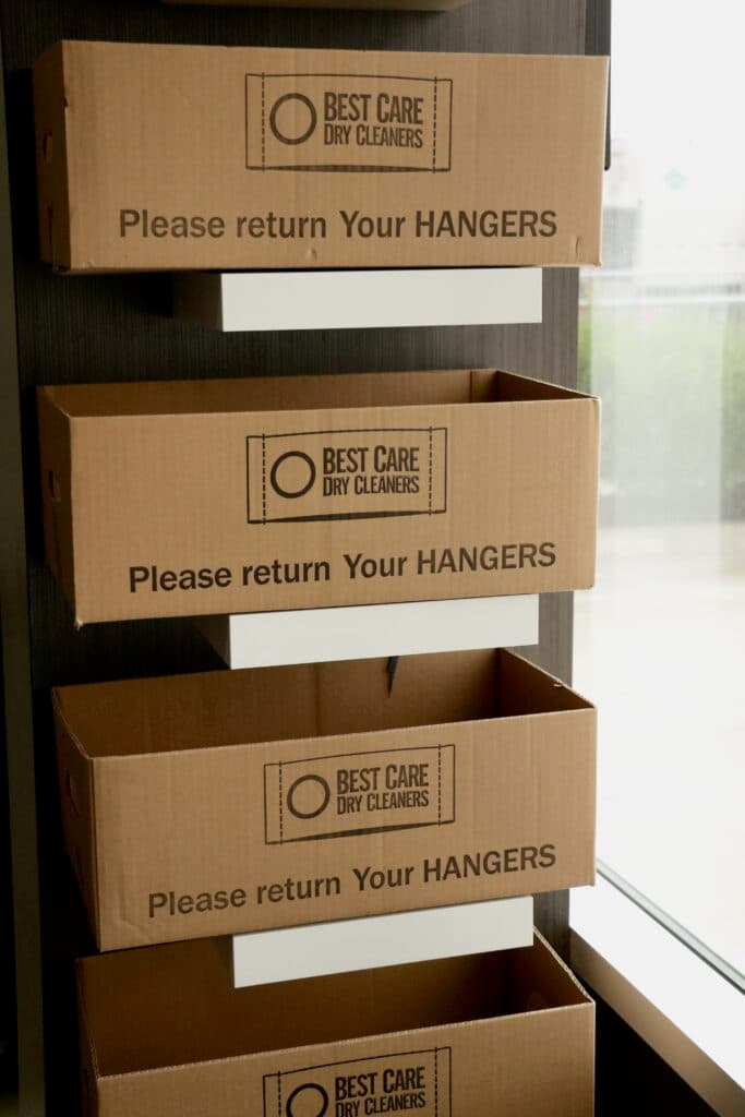 A stack of hanger recycling boxes